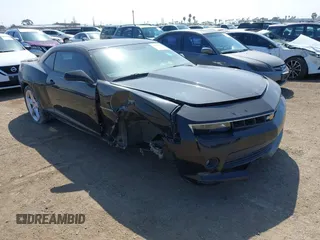 2015 Chevrolet Camaro LT z VIN 2G1FE1E3XF9194306, wystawiony jako IAAI lot #41869493 z przebiegiem 67 749 mil mil oraz . Historia ofert i sprzedaży dostępna na DreamBid. Obrazek 1.