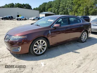 2012 Lincoln MKS EcoBoost with VIN 1LNHL9FT0CG806931, listed as a Copart auction lot 70657124 with 138,528 mi miles and Salvage title. Bid and sale history available at DreamBid. Image 1.