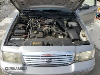 2006 Ford Police Interceptor z VIN 2FAFP71W96X163568, wystawiony jako Copart lot #62368215 z przebiegiem 116 536 mil mil oraz Szkoda całkowita • Salvage title. Historia ofert i sprzedaży dostępna na DreamBid. Obrazek 11.