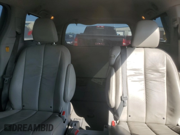 2012 Toyota Sienna XLE AAS z VIN 5TDYK3DC2CS196804, wystawiony jako Copart lot #65655755 z przebiegiem 298 629 mil mil oraz Czysty tytuł • Clean title. Historia ofert i sprzedaży dostępna na DreamBid. Obrazek 10.