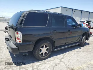 2002 GMC Yukon Denali z VIN 1GKEK63U62J241161, wystawiony jako Copart lot #58350085 z przebiegiem Nie podano mil oraz Szkoda całkowita • Salvage title. Historia ofert i sprzedaży dostępna na DreamBid. Obrazek 3.