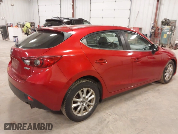 2014 Mazda Mazda3 i Touring with VIN JM1BM1L76E1100696, listed as a IAAI auction lot 41788756 with 155,011 mi miles. Bid and sale history available at carsss.com. Image 4.