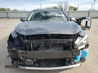 2024 Infiniti Q50 Luxe with VIN JN1EV7BP8RM600834, listed as a Copart auction lot 50489245 with 7,265 mi miles and Salvage title. Bid and sale history available at DreamBid. Image 5.