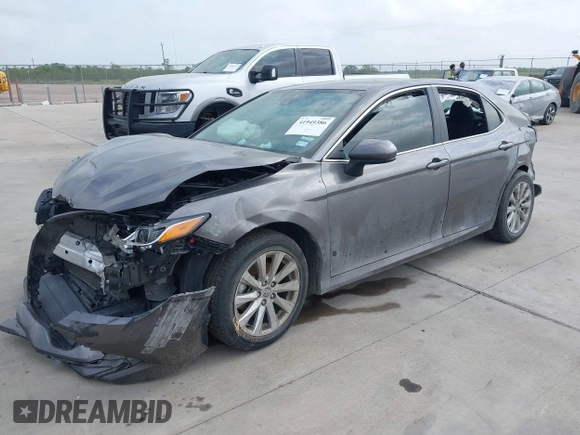 2020 Toyota Camry LE with VIN 4T1C11AK1LU505201, listed as a IAAI auction lot 42006393 with 106,526 mi miles and . Bid and sale history available at carsss.com. Image 2.