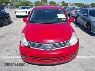 2009 Nissan Versa S with VIN 3N1BC13E69L500633, listed as a IAAI auction lot 42137113 with 193,491 mi miles and . Bid and sale history available at carsss.com. Image 12.