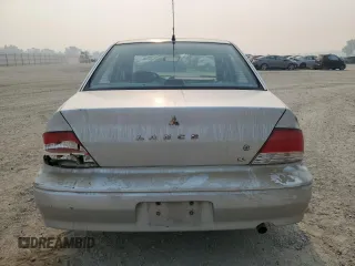 2002 Mitsubishi Lancer ES with VIN JA3AJ26E22U045919, listed as a Copart auction lot 63852225 with 184,071 mi miles and Salvage title. Bid and sale history available at DreamBid. Image 6.