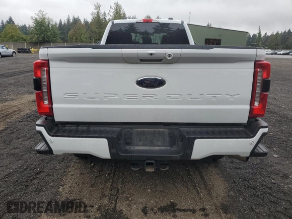 2023 Ford F-250 with VIN 1FT8X2BN0PEC27558, listed as a Copart auction lot 68699574 with 34,777 mi miles and Salvage title. Bid and sale history available at DreamBid. Image 6.