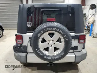 2008 Jeep Wrangler Unlimited Sahara with VIN 1J4GA59148L652001, listed as a Copart auction lot 48599655 with 161,436 mi miles and Clean title. Bid and sale history available at DreamBid. Image 6.