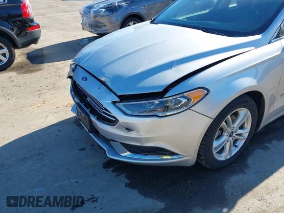 2018 Ford Fusion SE with VIN 3FA6P0LU1JR272522, listed as a IAAI auction lot 41796432 with 123,471 mi miles and . Bid and sale history available at DreamBid. Image 18.