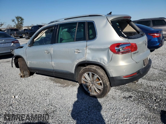 2014 Volkswagen Tiguan SE z VIN WVGAV3AXXEW502310, wystawiony jako Copart lot #42095985 z przebiegiem 130 033 mil mil oraz Szkoda całkowita • Salvage title. Historia ofert i sprzedaży dostępna na DreamBid. Obrazek 2.