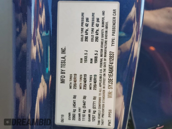 2019 Tesla Model 3 Mid Range with VIN 5YJ3E1EA6KF412837, listed as a Copart auction lot 50871195 with 39,570 mi miles and Salvage Title. Bid and sale history available at DreamBid. Image 12.