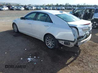 2015 Cadillac CTS with VIN 1G6AP5SX1F0139976, listed as a IAAI auction lot 42139888 with 149,174 mi miles and . Bid and sale history available at DreamBid. Image 3.