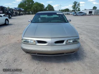1997 Oldsmobile 88 LS with VIN 1G3HN52K4V4860113, listed as a Copart auction lot 54242725 with 0 mi miles and Clean Title. Bid and sale history available at carsss.com. Image 5.