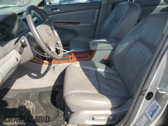 2002 Toyota Camry XLE z VIN 4T1BF32K22U532171, wystawiony jako Copart lot #54527965 z przebiegiem 165 637 mil mil oraz Szkoda całkowita • Salvage title. Historia ofert i sprzedaży dostępna na DreamBid. Obrazek 7.