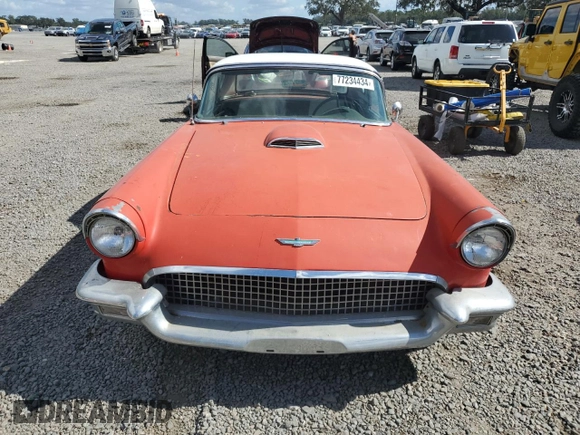 1957 Ford Thunderbird with VIN D7FH395675, listed as a Copart auction lot 77234434 with 15,312 mi miles and Salvage Title. Bid and sale history available at DreamBid. Image 5.