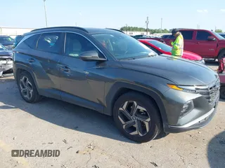 2022 Hyundai Tucson SEL z VIN 5NMJC3AE1NH152514, wystawiony jako IAAI lot #41868408 z przebiegiem 93 229 mil mil oraz . Historia ofert i sprzedaży dostępna na DreamBid. Obrazek 1.