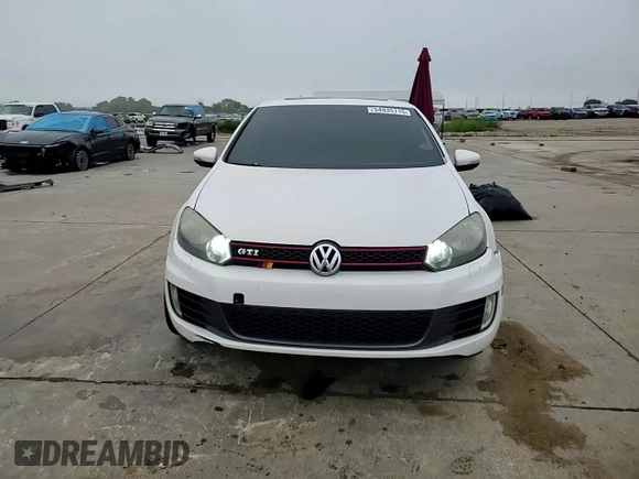 2012 Volkswagen GTI with VIN WVWHV7AJ2CW235408, listed as a Copart auction lot 54935115 with 110,475 mi miles and Salvage title. Bid and sale history available at DreamBid. Image 14.