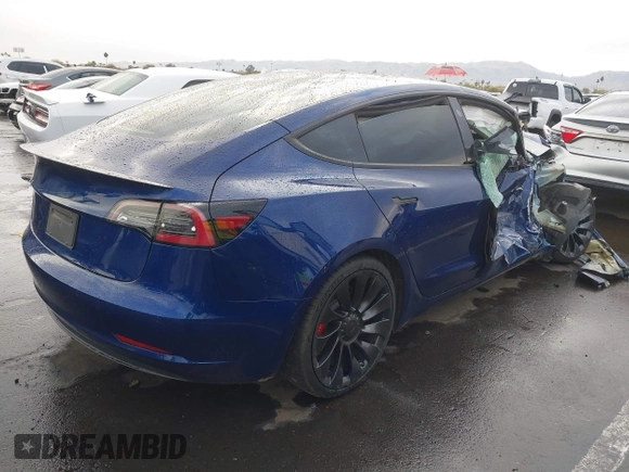 2022 Tesla Model 3 Performance with VIN 5YJ3E1EC7NF306192, listed as a IAAI auction lot 41453931 with 36,450 mi miles. Bid and sale history available at carsss.com. Image 4.