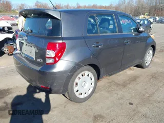 2009 Scion xD with VIN JTKKU10409J041234, listed as a IAAI auction lot 40838679 with 220,437 mi miles and . Bid and sale history available at DreamBid. Image 4.