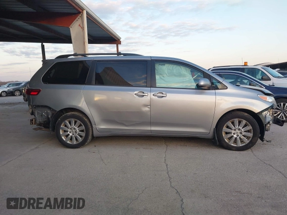 2016 Toyota Sienna LE with VIN 5TDJK3DC4GS133694, listed as a IAAI auction lot 41171171 with 99,680 mi miles. Bid and sale history available at carsss.com. Image 13.