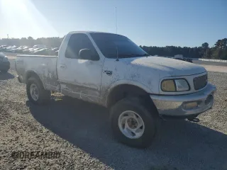 1998 Ford F-150 with VIN 1FTZF18W3WNB98041, listed as a Copart auction lot 77530824 with 194,712 mi miles and Salvage title. Bid and sale history available at DreamBid. Image 4.