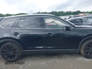 2022 Mazda CX-9 Touring Plus z VIN JM3TCBAY2N0619279, wystawiony jako IAAI lot #42373722 z przebiegiem 43 540 mil mil oraz . Historia ofert i sprzedaży dostępna na DreamBid. Obrazek 13.