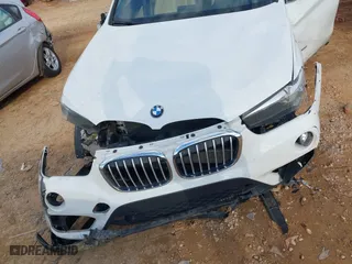 2018 BMW X1 sDrive28i with VIN WBXHU7C37J5H39401, listed as a IAAI auction lot 41421610 with 94,576 mi miles. Bid and sale history available at carsss.com. Image 6.
