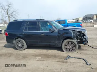 2014 Lincoln Navigator z VIN 5LMJJ2J53EEL08886, wystawiony jako IAAI lot #41971904 z przebiegiem 140 190 mil mil oraz . Historia ofert i sprzedaży dostępna na DreamBid. Obrazek 13.