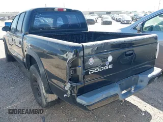2003 Dodge Dakota Sport with VIN 1D7HL38X63S228581, listed as a IAAI auction lot 41835200 with 273,562 mi miles and . Bid and sale history available at DreamBid. Image 3.