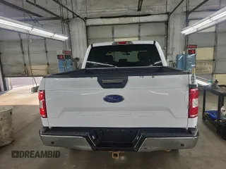2018 Ford F-150 XL with VIN 1FTEW1E59JKD11351, listed as a IAAI auction lot 42663848 with 128,761 mi miles and . Bid and sale history available at DreamBid. Image 57.