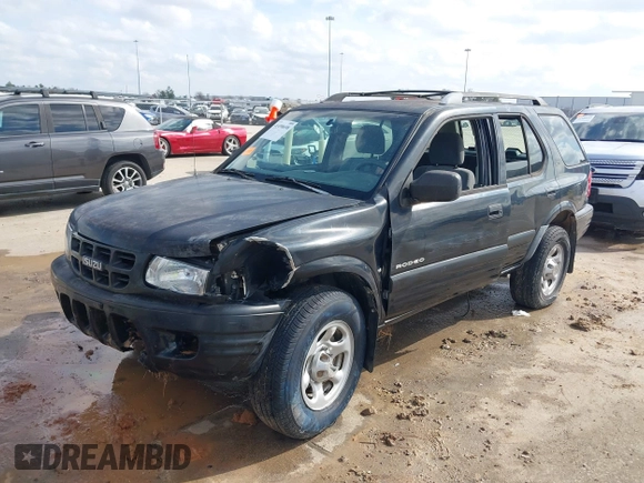 2001 Isuzu Rodeo S with VIN 4S2CK58W114363340, listed as a IAAI auction lot 41498698 with 185,408 mi miles and . Bid and sale history available at DreamBid. Image 17.