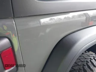 2021 Jeep Wrangler Unlimited Sport S z VIN 1C4HJXDG2MW542087, wystawiony jako IAAI lot #41893734 z przebiegiem 57 000 mil mil oraz . Historia ofert i sprzedaży dostępna na DreamBid. Obrazek 6.