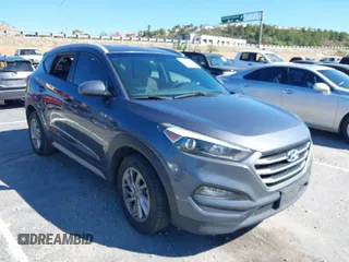 2018 Hyundai Tucson SEL with VIN KM8J3CA42JU618764, listed as a IAAI auction lot 41677046 with 127,980 mi miles. Bid and sale history available at carsss.com. Image 1.