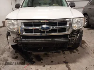 2012 Ford Escape XLT z VIN 1FMCU9DG4CKA72675, wystawiony jako IAAI lot #41212739 z przebiegiem 112 781 mil mil oraz . Historia ofert i sprzedaży dostępna na DreamBid. Obrazek 6.
