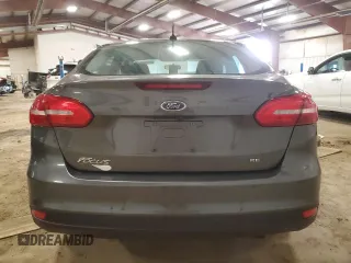 2018 Ford Focus SE with VIN 1FADP3F25JL249150, listed as a Copart auction lot 51837135 with 147,532 mi miles and Clean title. Bid and sale history available at DreamBid. Image 6.