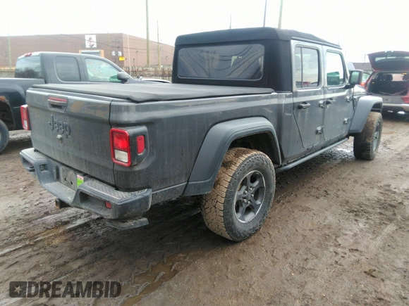 2021 Jeep Gladiator Sport S z VIN 1C6HJTAG3ML597041, wystawiony jako IAAI lot #41714640 z przebiegiem 46 402 mil mil oraz . Historia ofert i sprzedaży dostępna na DreamBid. Obrazek 4.
