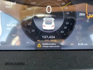 2013 Tesla Model S z VIN 5YJSA1DN0DFP08094, wystawiony jako Copart lot #60047045 z przebiegiem 137 434 mil mil oraz Szkoda całkowita • Salvage title. Historia ofert i sprzedaży dostępna na DreamBid. Obrazek 9.