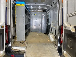 2020 Ford Transit Cargo with VIN 1FTBR1CG6LKA17312, listed as a IAAI auction lot 42284054 with 173,479 mi miles and . Bid and sale history available at DreamBid. Image 12.