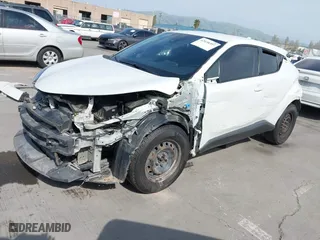 2018 Toyota C-HR XLE with VIN NMTKHMBX4JR049041, listed as a IAAI auction lot 42038397 with 74,930 mi miles. Bid and sale history available at carsss.com. Image 19.