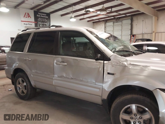 2006 Honda Pilot EX with VIN 2HKYF18416H534697, listed as a IAAI auction lot 41715642 with 224,093 mi miles and . Bid and sale history available at DreamBid. Image 12.