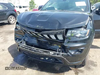 2018 Jeep Grand Cherokee Altitude with VIN 1C4RJEAG7JC354191, listed as a IAAI auction lot 42276081 with 51,220 mi miles and . Bid and sale history available at DreamBid. Image 6.