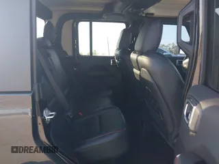 2023 Jeep Gladiator Rubicon z VIN 1C6JJTBGXPL543787, wystawiony jako IAAI lot #40963799 z przebiegiem 5 402 mil mil oraz . Historia ofert i sprzedaży dostępna na DreamBid. Obrazek 8.