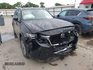 2025 Mazda CX-90 Preferred z VIN JM3KKBHD7S1208001, wystawiony jako IAAI lot #42503425 z przebiegiem 16 745 mil mil oraz . Historia ofert i sprzedaży dostępna na DreamBid. Obrazek 1.