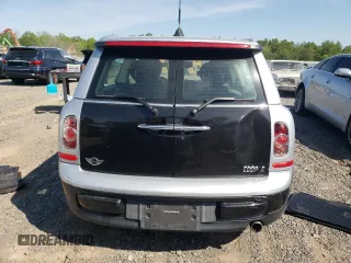2014 MINI Clubman z VIN WMWZF3C54ET493599, wystawiony jako Copart lot #56404485 z przebiegiem 65 007 mil mil oraz Szkoda całkowita • Salvage title. Historia ofert i sprzedaży dostępna na DreamBid. Obrazek 6.