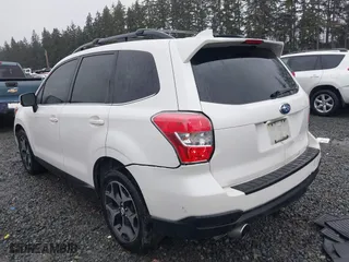 2016 Subaru Forester 2.0XT Premium with VIN JF2SJGDC1GH504685, listed as a IAAI auction lot 41444148 with 138,188 mi miles. Bid and sale history available at carsss.com. Image 3.