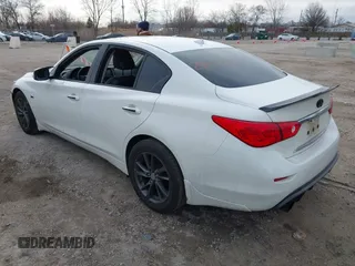 2017 Infiniti Q50 Premium with VIN JN1EV7AR1HM841541, listed as a IAAI auction lot 41876174 with 64,552 mi miles and . Bid and sale history available at carsss.com. Image 3.