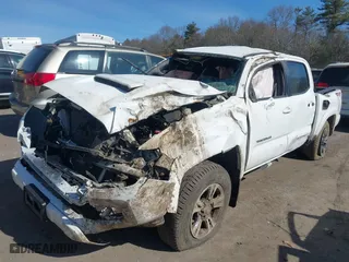 2017 Toyota Tacoma SR5 with VIN 3TMCZ5AN8HM064886, listed as a IAAI auction lot 41750826 with 163,398 mi miles. Bid and sale history available at carsss.com. Image 2.