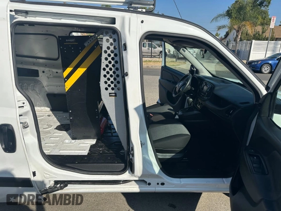 2022 Ram ProMaster City Cargo Tradesman with VIN ZFBHRFAB8N6W22817, listed as a Copart auction lot 66117855 with 34,878 mi miles and Salvage title. Bid and sale history available at DreamBid. Image 6.