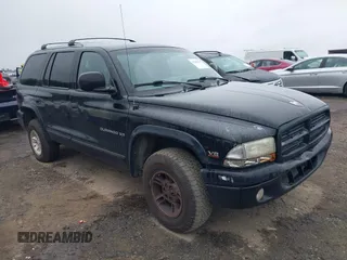 1999 Dodge Durango z VIN 1B4HS28Y6XF631018, wystawiony jako IAAI lot #42385147 z przebiegiem 372 666 mil mil oraz . Historia ofert i sprzedaży dostępna na DreamBid. Obrazek 1.