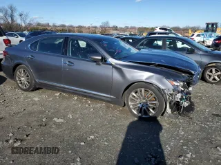 2015 Lexus LS 460 L with VIN JTHGL1EFXF5055493, listed as a Copart auction lot 86601044 with 130,849 mi miles and Salvage title. Bid and sale history available at DreamBid. Image 4.